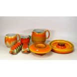 A collection of Orange Shelley Pottery Harmony Ware to include graduated Jug, posy dish, toast racks