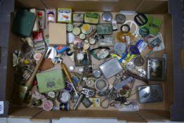 A mixed collection of items to include vintage badges, cigarette cases , tin boxes etc
