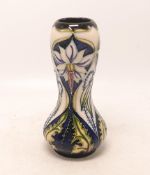Moorcroft vase in the Meadow Star design, dated 2001,h.15.5cm, boxed.
