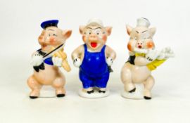 Genuine Walt Disney copyright ceramic Three Little Pigs toothbrush holders, each stamped foreign,