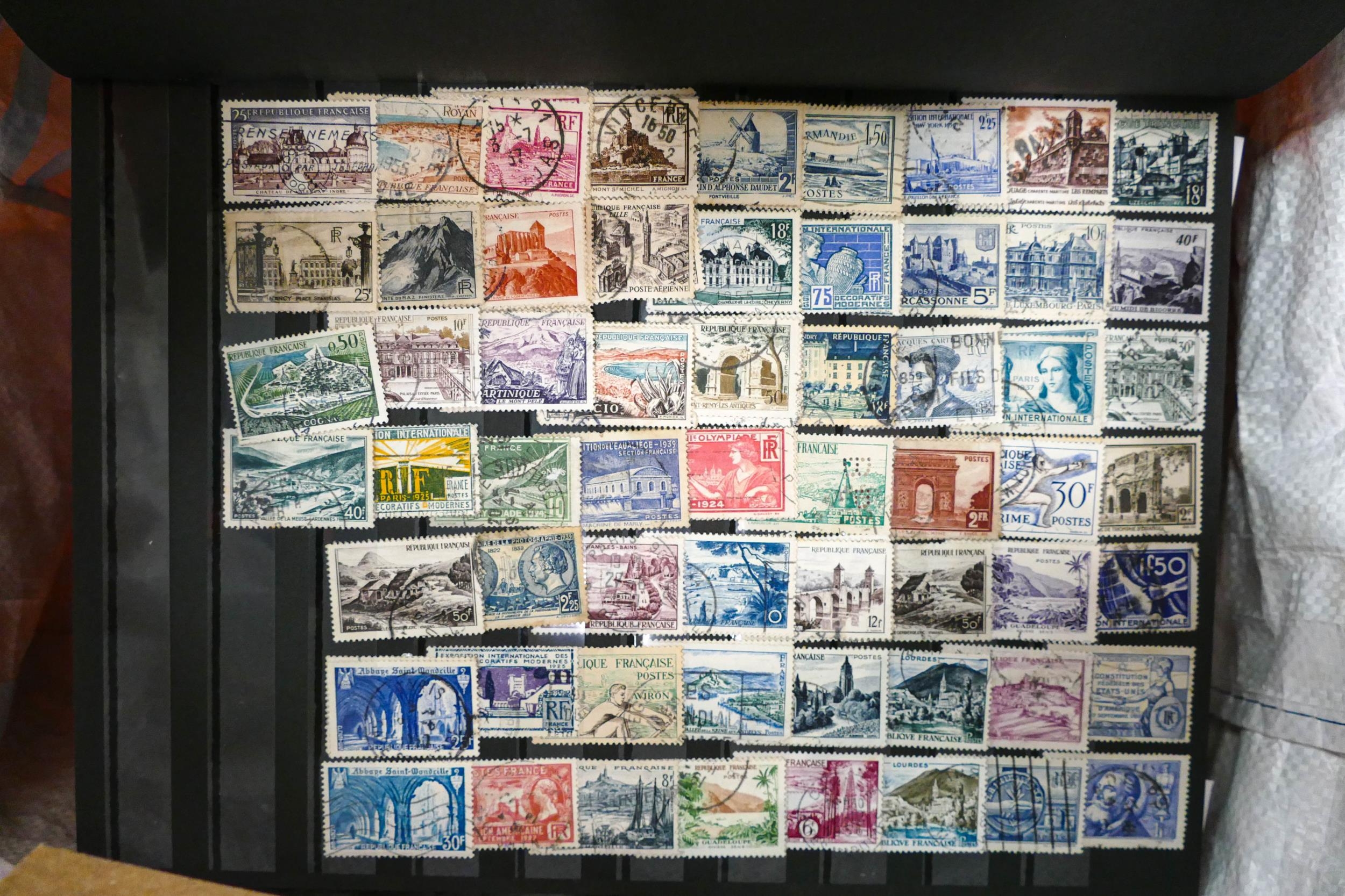 4 x large bags of world & UK stamps containing thousands of stamps loose in boxes, bags, albums & - Image 8 of 17