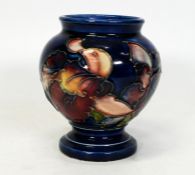 Moorcroft Orchid Patterned Vase on Blue Ground, height 8.5cm