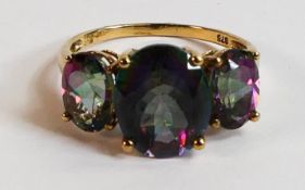 9ct gold ladies dress ring, set with three purple stones, size O, 3.3g.