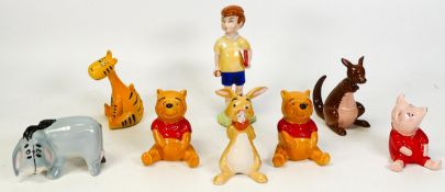 Beswick Winnie the Pooh figures to include Christopher Robin, Winnie the Pooh x 2 , Tigger,