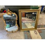 Two gilt framed wall mirrors to include one 20th century rococo example and one overpainted 19th