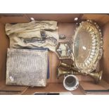 A collection of mixed metalware items to include silver plated cutlery, brass candlesticks, cased