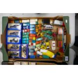 A mixed collection of items to include Lledo, Corgi, Matchbox and similar play worn vehicles and
