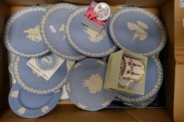 A collection of 8 Wedgwood Blue Jasper Christmas Plates together with similar mug & lidded box