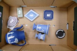 A mixed collection of Wedgwood items to include mauve oval box, sage green box, blue jasper vases