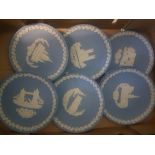 A collection of Wedgwood blue jasperware Christmas plates (14)