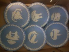 A collection of Wedgwood blue jasperware Christmas plates (14)