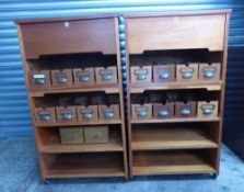 2 Mid century Teak Haberdashery cabinets with integral filing drawers on Metal Castors 103cm H
