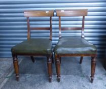 A pair of victorian bar back dining chairs with turned front supports