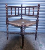 Late victorian arts and crafts Turned Bobbin Oak Rush Seated corner chair circa 1890 (68cm H)