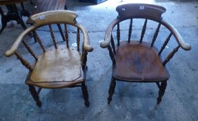 Two vintage Captain style Armchairs