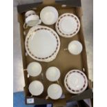 Paragon Elegance pattern tea and dinner ware items to include 6 trios, milk / sugar and cake