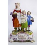 Dresden 'Yardley Old English Lavender' advertising figure group, 32cm high.