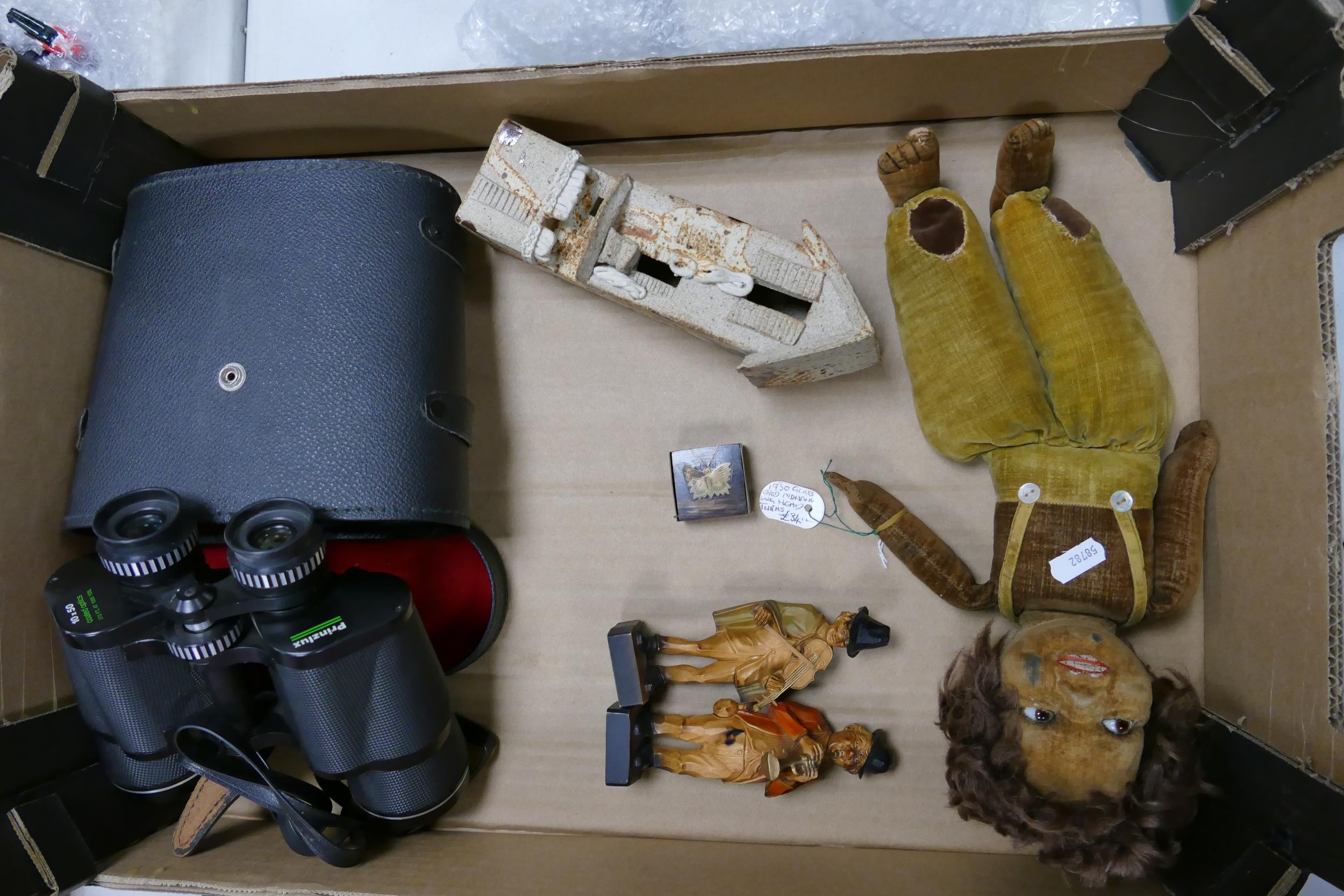 A mixed collection of items to include cased Prinzlux Binoculars, Vintage Toy Doll, Black Forest