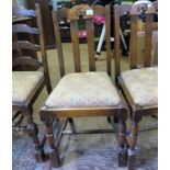 Pair of early 20th century oak dining chairs, together with one non-matching example (3).