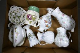 A mixed collection of Wedgwood items to include Rose Hip patterned Vase & jug, Sarah's Garden Jug,