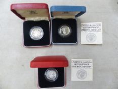 3 Sterling Silver Proof One Pound Coins. 1 Dated 1983 and 2 Dated 1984