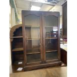 Dark Oak Glazed Bookcase. Width 26cm
