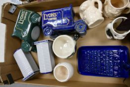 A collection of Wasw Advertising Moneyboxes, novelty tankards , Cheese Dish etc These were removed
