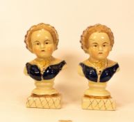 Two Staffordshire child porcelain busts . Height 20cm