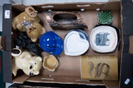 A collection of Wade Decanters, Advertising ashtrays, moneyboxes etc These were removed from the