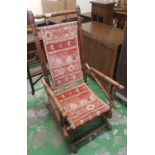 An American rocking chair with First Nation style fabric.