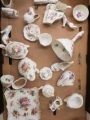 A collection of Hammersley ornaments to include frog, boots, clock, bell, candlestick, pin dish ,