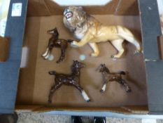 A collection of Beswick figures to include Lion (a/f) & 3 brown foals