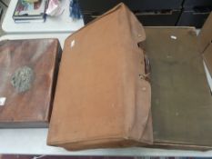 Three pieces of vintage luggage to include small leather case with keys and 2 canvas military/