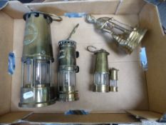 A mixed collection of brassware items to includea Type 6 brass Eccles miners lamp together with a