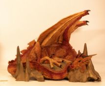 Large resin figure of a dragon on a rock