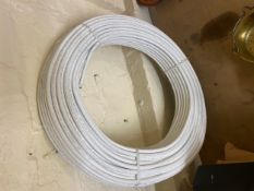 A reel of Tweetop Pert flexible piping.