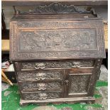 Late 19th Century Anglo Indian profusely carved Bureau with carved dragon detail 92cm W x 112cm