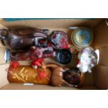 A mixed collection of oriental inspired items including large wooden water buffalo, Canton Buddha,