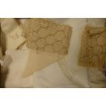 A collection of Linen & lace items to include table cloths, doilies, napkins etc (1 tray)