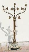 Brass ecclesiastic lamp with three light fittings. ivy decoration , lion claw feet and volute