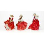 Royal Doulton lady figures Autumn Breezes Hn1939, The Skater Hn2117 & Blown Top O the Hill Hn1834(3)