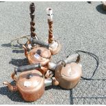 Three vintage electric copper kettles together with two wooden lamps