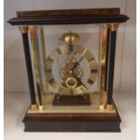 Wooden Cased Skeleton Clock, height of case 29cm