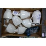 A collection of Wade Boots Chemist Adverting Jugs, Vases, Bed Warmer etc . These items were