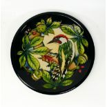 Moorcroft Inglewood charger decorated with a Lester spotted woodpecker. Dated 2002, diameter 26cm