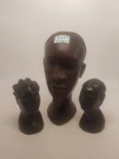 A group of three African carved hardwood busts, height of tallest 25cm (3).