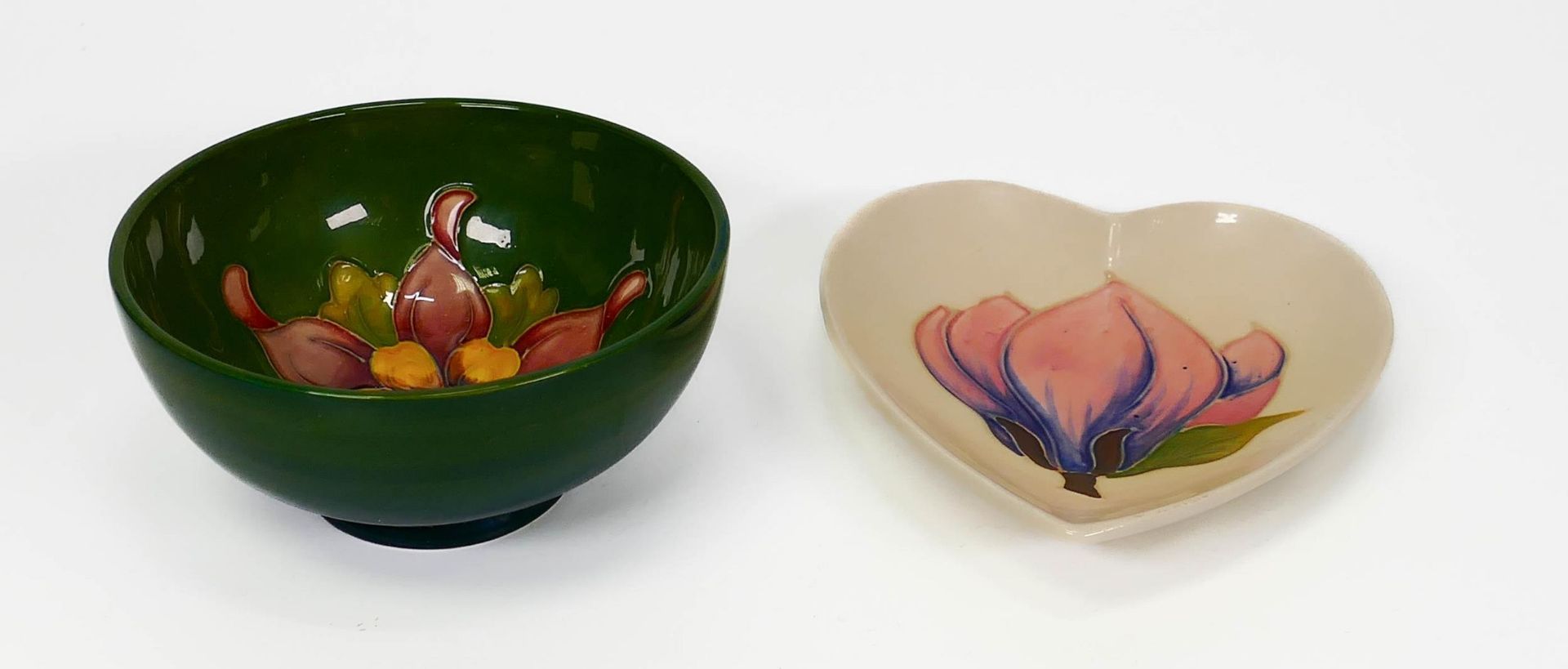 Moorcroft Orchid on green ground bowl,(d11cm) & cream heart shaped dish(2)