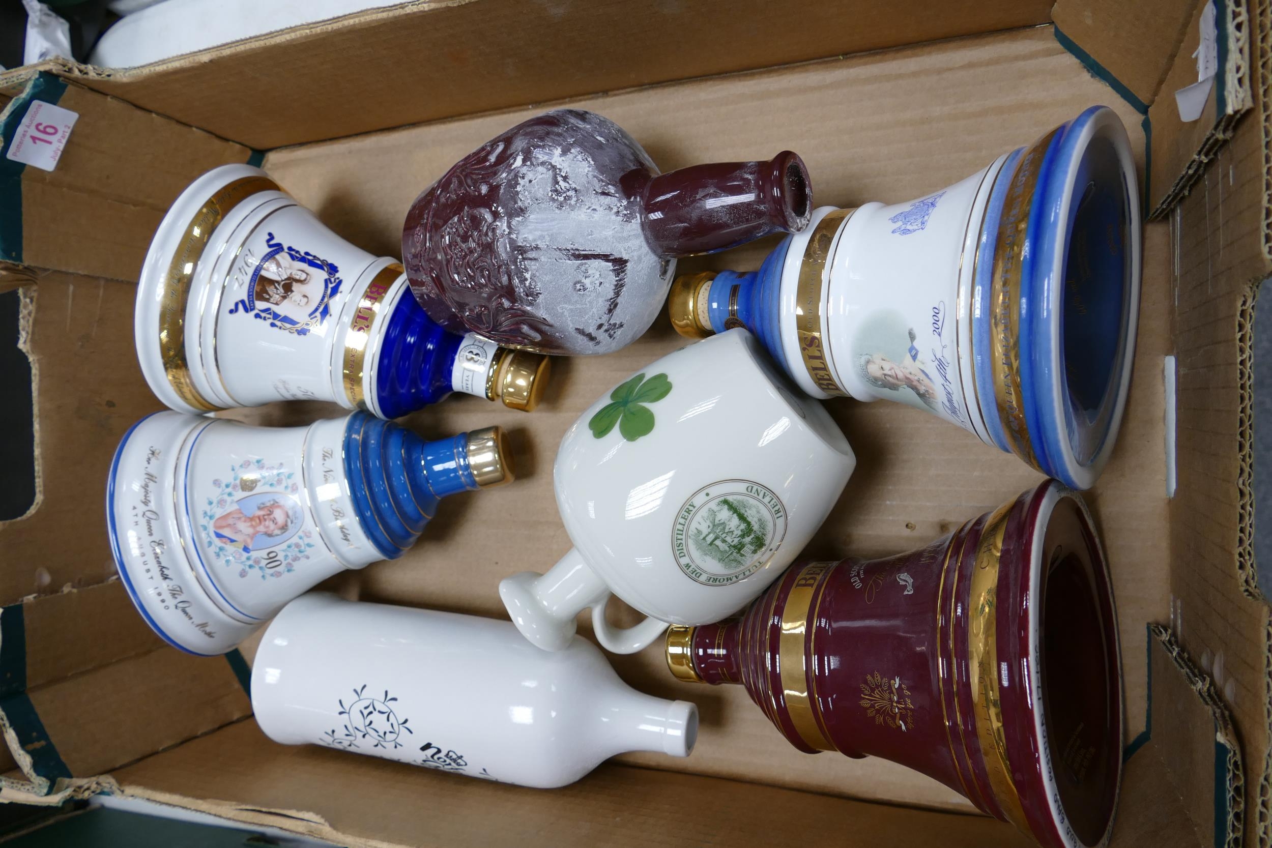 A collection of Wade Whisky & Spirt Decanters to include Bells, Norfolk Gin, Tullamore Dew, etc .