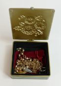 A Enamelled floral jewellery box containing some costume jewellery.