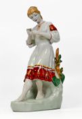 Eastern European Figure of Girl Picking Flowers, height 28cm